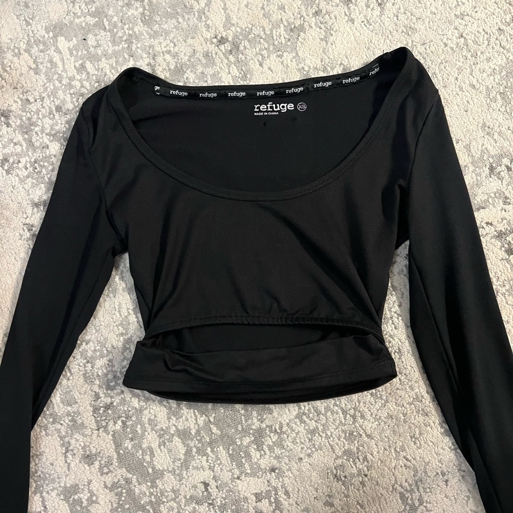 black long sleeve top with stomach cutout